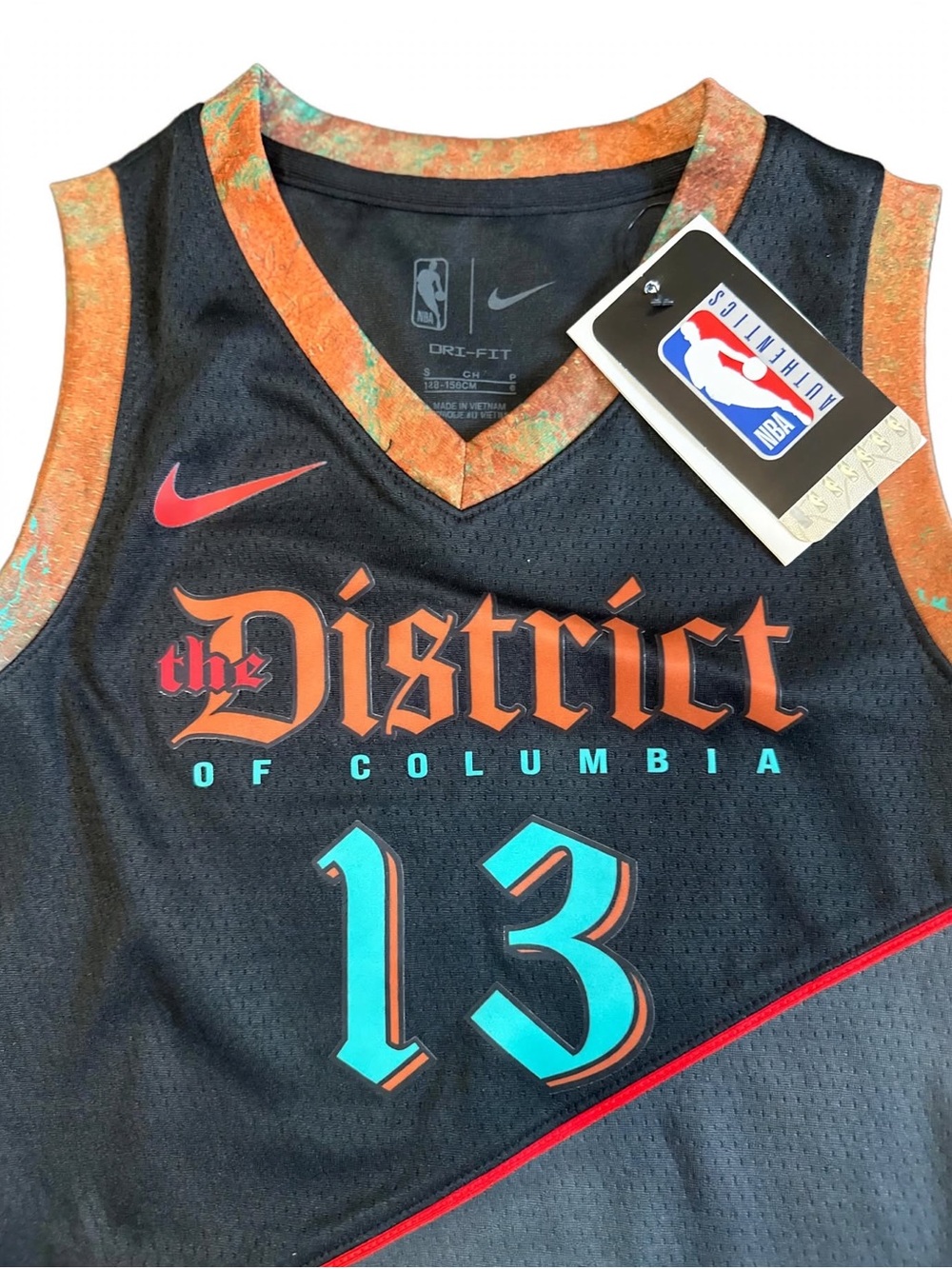 Nike Kids One-Piece Black with Orange and Teal Accents